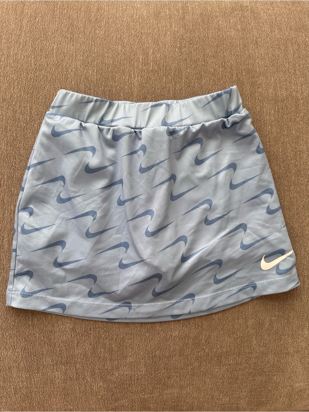 Nike Light Blue Girls' Athletic Skort with Navy Swoosh Pattern